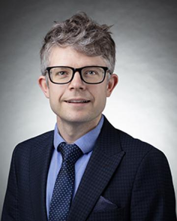 Dr. Gerard M. Healy MB BCh BAO, MD, FFRRCSI, EBIR